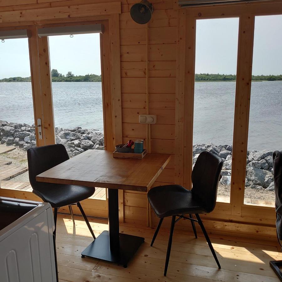 Waterhuisjes Op De Pier Van Lauwersmeerplezier! Lauwersoog Ngoại thất bức ảnh