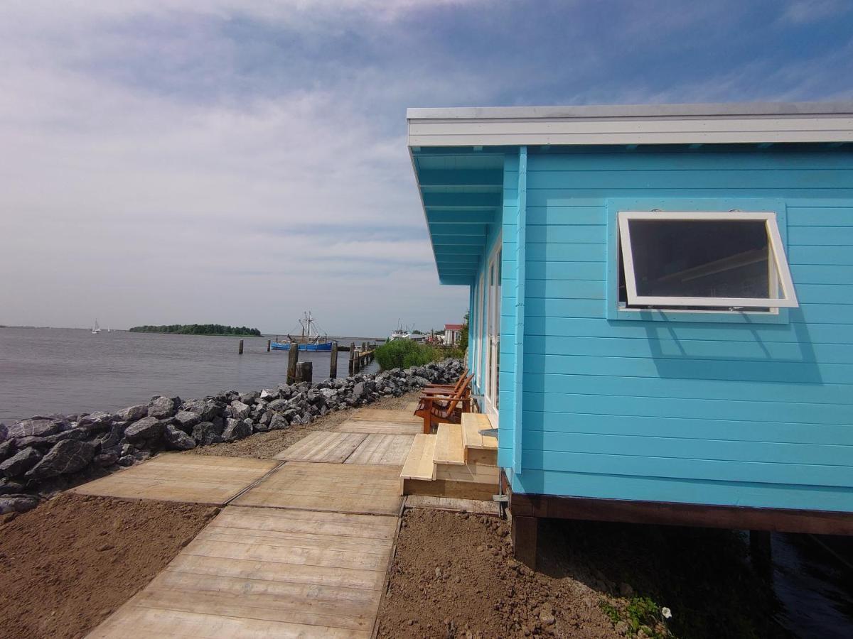 Waterhuisjes Op De Pier Van Lauwersmeerplezier! Lauwersoog Ngoại thất bức ảnh
