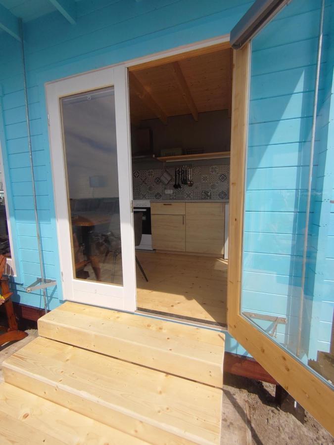 Waterhuisjes Op De Pier Van Lauwersmeerplezier! Lauwersoog Ngoại thất bức ảnh